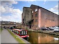 SE1437 : Leeds and Liverpool Canal, Former Canal Company Warehouse by Victoria Street Bridge (1) by David Dixon