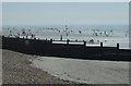 SZ7698 : Groynes and sand, West Wittering by Rob Farrow