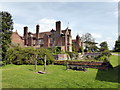 TL8647 : Stocks outside Kentwell Hall by PAUL FARMER