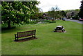 SU2526 : Village green bench and picnic bench, West Dean by Jaggery