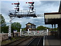 TL0997 : Signals and level crossing at Wansford Station by Richard Humphrey