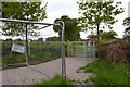 SJ7856 : Alsager: path and metal kissing gate by Jonathan Hutchins