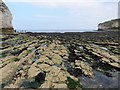 TA2570 : Rock  scars  cover  Selwicks  Bay  at  low  water by Martin Dawes