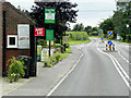 TF9632 : A148, Holt Road, Passing the Green Man at Little Snoring by David Dixon