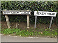 TQ7195 : Downham Road & Heath Road signs by Geographer