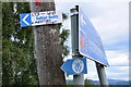 NS5093 : Signs at the junction, Drymen Road Cottage by Jim Barton