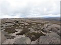 NJ0604 : Exposed rocks on Creag Mhor by Graham Robson