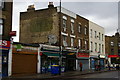 TQ3576 : Shops and ghost-sign, Queens Road, Peckham by Christopher Hilton