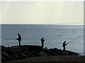 TR2235 : Anglers on a Folkestone beach by pam fray