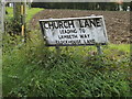 TM1159 : Church Lane sign by Geographer