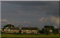 TL2267 : Houses at the north end of Offord Cluny, from the railway by Christopher Hilton