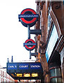 TQ2578 : London Underground roundels, Earl's Court by Jim Osley