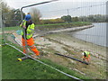 SP9114 : Repairing Startops Reservoir (2) Erecting Fencing by Chris Reynolds