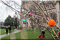 SP9211 : A Decorated Tree in Tring Churchyard by Chris Reynolds