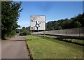 SY3594 : Road sign, Charmouth roundabout by Derek Harper