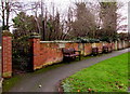 SJ8004 : Churchyard path and benches, Albrighton by Jaggery