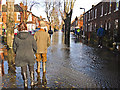 NY4055 : Watching the floodwater level in Broad Street by Rose and Trev Clough