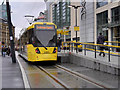 SJ8398 : Metrolink Tram at Exchange Square by David Dixon