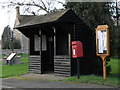 TF1406 : Bus shelter, post box and parish noticeboard, Etton by Paul Bryan