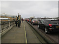 TQ1769 : Queues on Kingston Bridge by Hugh Venables