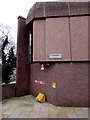 ST2995 : Yellow grit bin in a corner of Monmouth Square, Cwmbran Shopping Centre by Jaggery