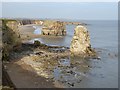 NZ4064 : Cliffs, sea stacks and beach at Marsden by Oliver Dixon