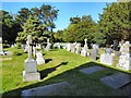 SH7980 : Graves in St Hilary's churchyard by Gerald England