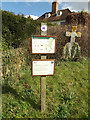 TM1354 : Footpath Signs at St.Mary's Church by Geographer