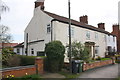 SK5021 : Houses on Loughborough Road with rebuilt brick walls by Roger Templeman