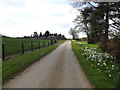 TM1257 : Footpath to The Green & entrance of Home Farm by Geographer