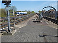 TQ1085 : A Chiltern train passes Ruislip Gardens Underground station by Marathon