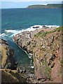 SX7536 : Rocky coast below Deckler's Cliff by Philip Halling