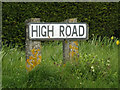 TM1852 : High Road sign by Geographer