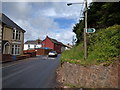 ST0012 : Road through Halberton and Public Footpath sign by Rob Purvis