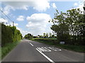 TM1853 : B1078 Swilland Road & footpath by Geographer