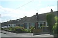 SJ6951 : Bungalows on Stock Lane, Wybunbury by Christopher Hilton