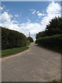 TL9780 : Lodge Lane & footpath to Common Road by Geographer