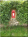 TM0280 : Whitehouse Farm George V Postbox by Geographer