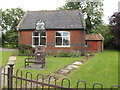 TL9877 : Market Weston Village Hall & sign by Geographer