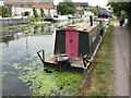 TQ2282 : Soft Asylum, narrow powered boat on Paddington Branch canal by David Hawgood