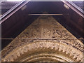 SE2740 : St John the Baptist, Adel - frieze by Stephen Craven