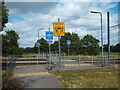 TQ3567 : Tram crossing near South Norwood by Malc McDonald