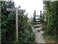 TQ5303 : Sign and Stile at Junction of Footpath and South Downs Way by PAUL FARMER