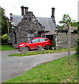 SH7400 : Wooden signpost near Deildy, Machynlleth by Jaggery