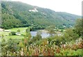 SN6979 : The Cwm Rheidol reservoir from the train by Derek Voller