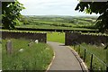 SS2203 : The churchyard and beyond, Marhamchurch by Derek Harper