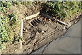 TG0723 : Drain on Kerdiston Road by Geographer