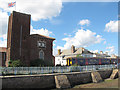 SX9781 : The old pumping station, Starcross, with train by Stephen Craven