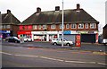 SJ8288 : Shops in Hollyhedge Road, Wythenshawe, Manchester by P L Chadwick