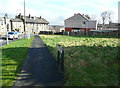 SE1320 : Footway and 'grass triangle', Clough Lane / New Hey Road, Rastrick by Humphrey Bolton